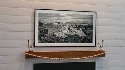 Black and White photo of the snow covered Grand Canyon inset into a Samsung Frame TV