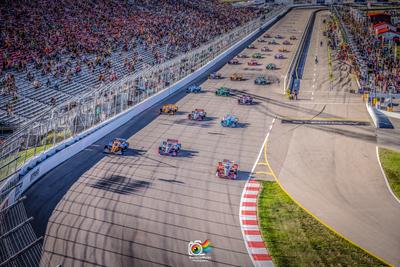 IndyCars doing a parade lap at World Wide Technology Raceway