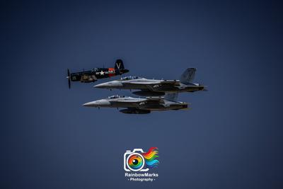 Two EA-18G Growlers with a F4U Corsair during Friday Practice flights