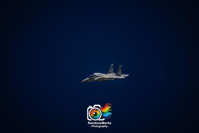 Boeing F-15QA flight on a deep blue sky